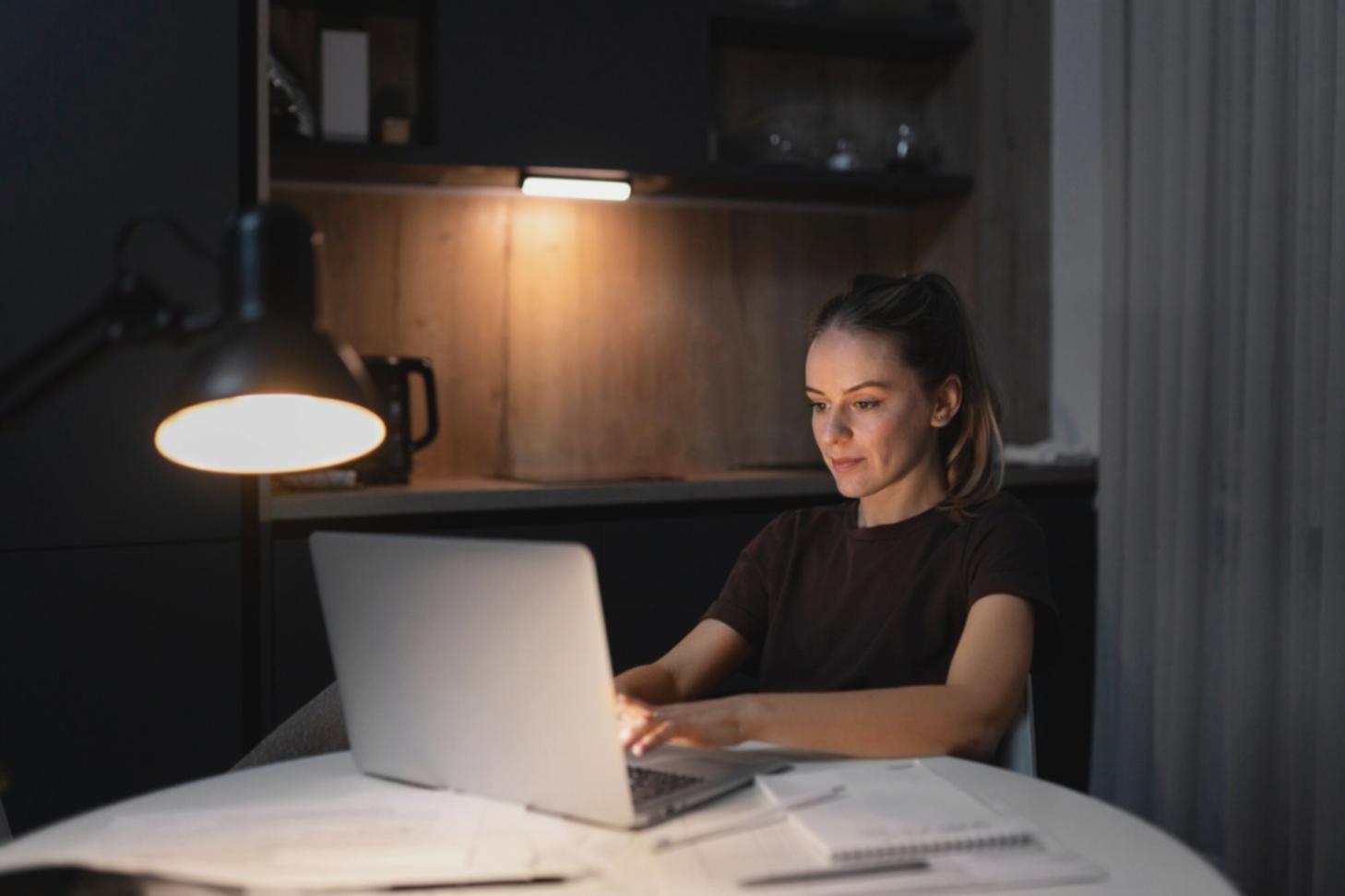 Instructor working one-on-one with student on financial modeling techniques